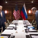 U.S. Secretary of State John Kerry and Russian Foreign Minister Sergey Lavrov take their seats following a photo a photo opportunity in Vienna